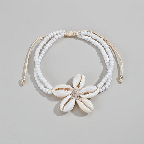 Bohemian Fußkettchen mit Muschelblume - Stilvolles Accessoire für Sommer und Urlaub